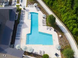 Sunny Haven: Chic 2BR/2BA with Pool & Gym - Image 2