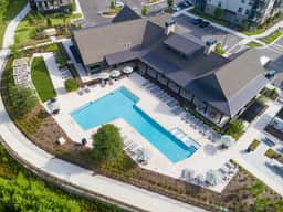 Tropical Retreat: Luxe 2BR/2BA with Pool & Gym - Image 2