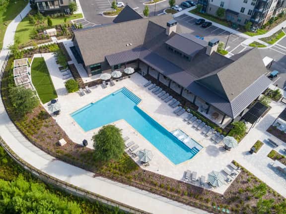 Tropical Retreat: Luxe 2BR/2BA with Pool & Gym - Image 2