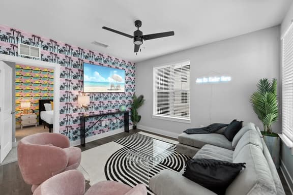 Tropical Retreat: Luxe 2BR/2BA with Pool & Gym - Image 1
